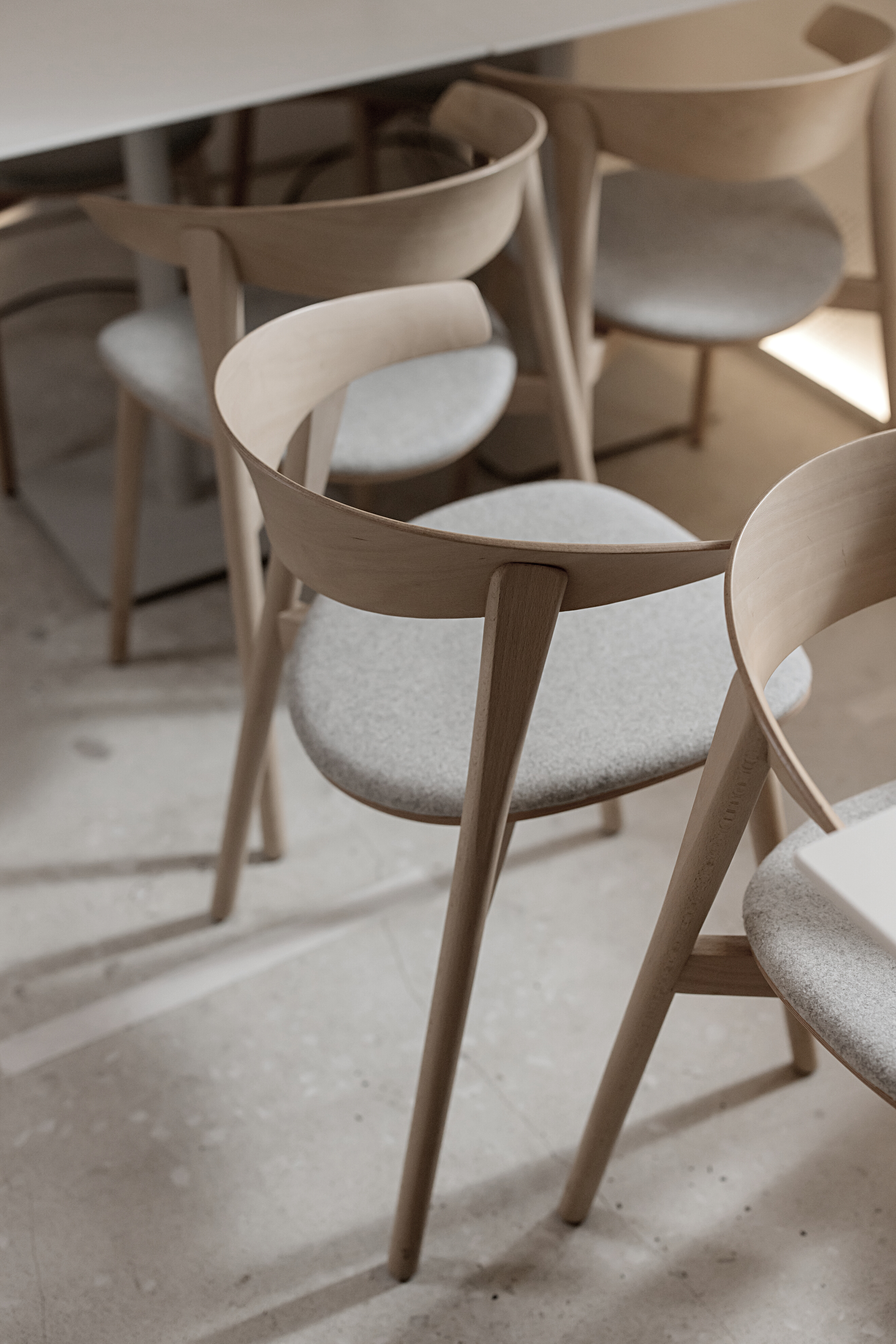 White Wooden Chair on White Floor Tiles